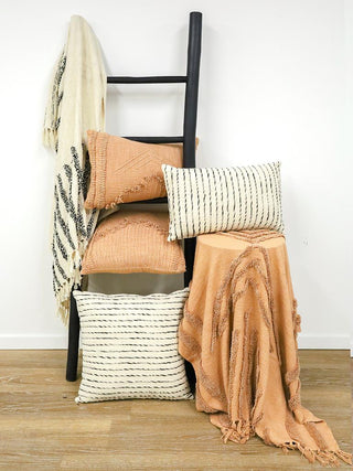 Luxurious Byblos throw blanket with embroidery in terracotta pink